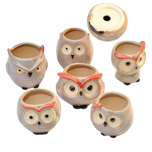 Vaso de Flor em Cerâmica com design de coruja, perfeito para adicionar um toque encantador à sua decoração. Ideal para exibir flores ou como peça decorativa em qualquer ambiente.